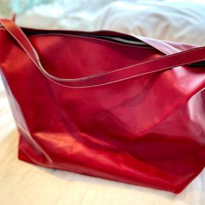 Red genuine leather overnight bag